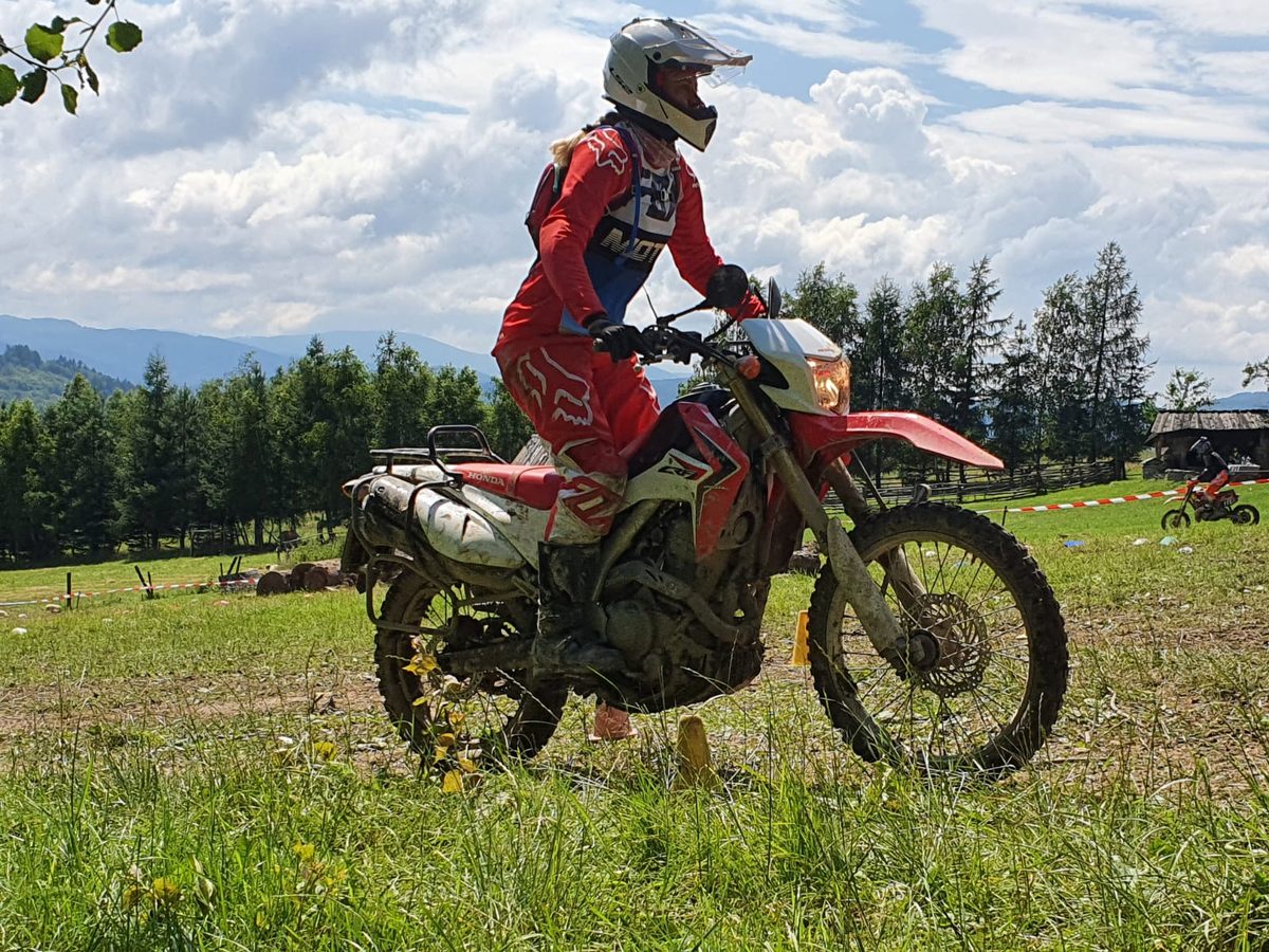 Jagoda Pasko riding an enduro motorcycle off-road