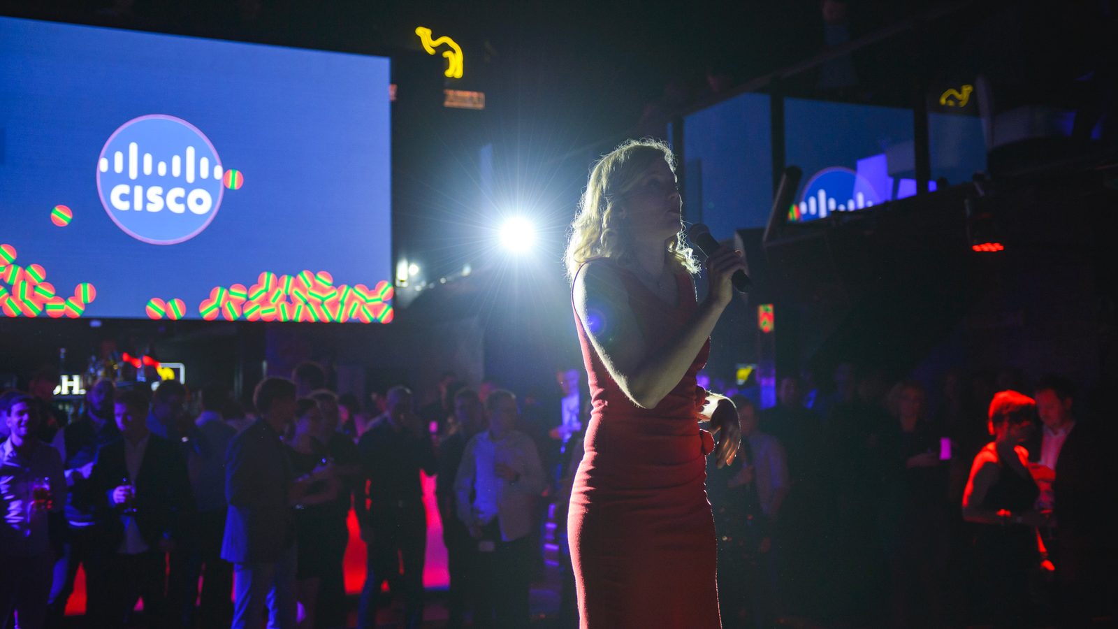 Jagoda Pasko speaking on stage at a Cisco event